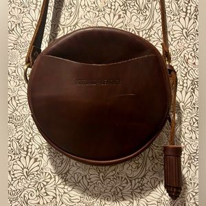 Portland Leather large circle bag w/ large tassel crossbody strap classic brown